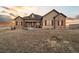 Stunning ranch-style home with stone accents and landscaping at 38911 E Wesley Ave, Bennett, CO 80102