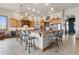 Large kitchen with granite counters and island seating at 38911 E Wesley Ave, Bennett, CO 80102