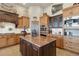 Spacious kitchen with double ovens and granite island at 38911 E Wesley Ave, Bennett, CO 80102