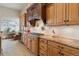 Modern kitchen with granite counters and ample cabinet space at 38911 E Wesley Ave, Bennett, CO 80102