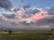 Scenic landscape with dramatic sunset clouds at 38911 E Wesley Ave, Bennett, CO 80102