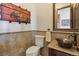 Stylish powder room with copper sink and tile flooring at 38911 E Wesley Ave, Bennett, CO 80102