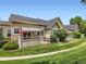 Charming home with a well-manicured lawn and fenced patio space at 6626 S Reed Way # A, Littleton, CO 80123