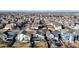Expansive aerial view showcasing a neighborhood with well-maintained homes and landscaping, giving a sense of community at 5436 S Versailles Way, Aurora, CO 80015