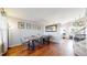 Warm dining room featuring hardwood floors, and stairway to the second level at 5436 S Versailles Way, Aurora, CO 80015