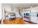 View of the living space with hardwood floors, and comfortable furniture at 5436 S Versailles Way, Aurora, CO 80015