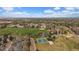 Community aerial view featuring green spaces, tennis courts, and pool in residential neighborhood at 7914 S Clayton Cir, Centennial, CO 80122