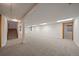 Spacious basement with white walls and a staircase at 7914 S Clayton Cir, Centennial, CO 80122
