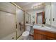 Well-lit bathroom with a glass shower and vanity at 7914 S Clayton Cir, Centennial, CO 80122