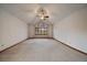 Spacious bedroom with a ceiling fan, vaulted ceiling, and natural light at 7914 S Clayton Cir, Centennial, CO 80122