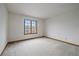 Empty bedroom featuring a window that lets in plenty of natural light at 7914 S Clayton Cir, Centennial, CO 80122