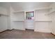 Spacious walk-in closet with built-in shelving and a window at 7914 S Clayton Cir, Centennial, CO 80122