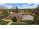 Community pool and clubhouse area features a sparkling pool and patio seating area at 7914 S Clayton Cir, Centennial, CO 80122