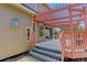 This deck with pergola includes sliding glass doors to the interior at 1446 Braewood Ave, Highlands Ranch, CO 80129