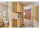 Hallway with a bathroom on the left and a bedroom at the end at 1446 Braewood Ave, Highlands Ranch, CO 80129