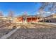 Backyard featuring a covered patio perfect for outdoor entertaining at 1051 Lima St, Aurora, CO 80010