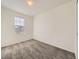 Bedroom featuring plush carpeting and a bright window at 18241 E 47Th Dr, Denver, CO 80249