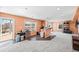 Uncluttered basement space with sliding glass door and bar area at 1929 Baguette Dr, Castle Rock, CO 80108