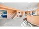 Open basement area featuring carpeted floors and a staircase to the upper levels at 1929 Baguette Dr, Castle Rock, CO 80108