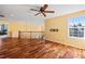 Spacious upstairs living area features hardwood floors, high ceilings, and plenty of natural light at 1929 Baguette Dr, Castle Rock, CO 80108