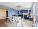 Stylish living room with blue walls, fireplace, built-in shelves, contemporary decor, and plush furniture at 1929 Baguette Dr, Castle Rock, CO 80108