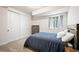 Basement bedroom with egress window and large closet at 5088 S Quail St, Littleton, CO 80127