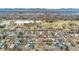 Beautiful aerial view shows the home's location near a park, lake, and other neighborhood residences at 1034 S Williams St, Denver, CO 80209