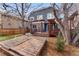 Inviting backyard with wooden deck, patio, and pergola perfect for outdoor living at 1034 S Williams St, Denver, CO 80209