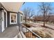 Nice view of the home's front porch, landscaping, and neighborhood location at 1034 S Williams St, Denver, CO 80209