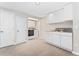 Basement laundry room with cabinets, sink, washer, and dryer at 1034 S Williams St, Denver, CO 80209