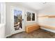 A practical mud room offers an exit to the backyard and features custom bench and storage solutions at 1034 S Williams St, Denver, CO 80209