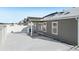 Backyard view of house with covered patio at 507 Bonneville Ave, Fort Lupton, CO 80621