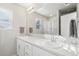 Bathroom with double vanity and large mirror at 507 Bonneville Ave, Fort Lupton, CO 80621