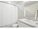 Clean bathroom with shower/tub combo and white vanity at 507 Bonneville Ave, Fort Lupton, CO 80621