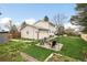 Spacious backyard featuring outdoor seating and a well-maintained lawn at 10618 W Layton Pl, Littleton, CO 80127
