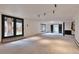 Expansive basement featuring a walkout, carpet floors, and white walls with black trim at 4853 S Crystal St, Aurora, CO 80015