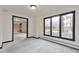 Living room featuring large windows with a great view of the back yard at 4853 S Crystal St, Aurora, CO 80015