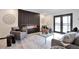 Living room showcases a modern fireplace and plush seating, creating a relaxing ambiance at 4853 S Crystal St, Aurora, CO 80015