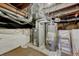Basement featuring a furnace and water heater at 2421 W 38Th Ave, Denver, CO 80211