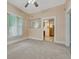 Bright living room boasting plush carpet and a neutral color palette, perfect for relaxation at 2421 W 38Th Ave, Denver, CO 80211