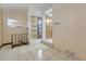 Room with tiled floor, mirror, closet and a staircase at 2421 W 38Th Ave, Denver, CO 80211