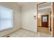 Small room with tiled floor, white walls and a window to let the sunlight in at 2421 W 38Th Ave, Denver, CO 80211
