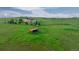 Beautiful acreage with barn and pasture, featuring plenty of room and some great Colorado views and lush greenery at 29333 Rawhide Ct, Elizabeth, CO 80107