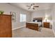 Comfortable bedroom with a ceiling fan and a window providing natural light at 29333 Rawhide Ct, Elizabeth, CO 80107