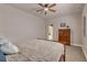 Neutral bedroom with ceiling fan and comfortable furnishings at 29333 Rawhide Ct, Elizabeth, CO 80107