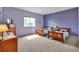 Bright bedroom with twin beds, large window, and charming decor at 29333 Rawhide Ct, Elizabeth, CO 80107