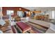 Spacious open-concept living area featuring a kitchen, dining, and living space with seamless flow at 29333 Rawhide Ct, Elizabeth, CO 80107