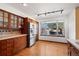 Bright kitchen with modern appliances and ample counter space by a sunny window at 3151 E 134Th Cir, Thornton, CO 80241
