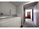 Laundry room with washer, dryer, and a hall closet for storage at 10042 Buena Vista Dr, Conifer, CO 80433