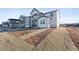 New home showcasing modern farmhouse style at 8950 Whiteclover St, Littleton, CO 80125